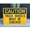 CAUTION -  Truck Wheels must be Chocked Schild